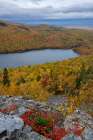 USA, Maine. Lowbush blueberry, fall foliage and South Branch Pond from Traveler Mountain, Baxter SP Art Print